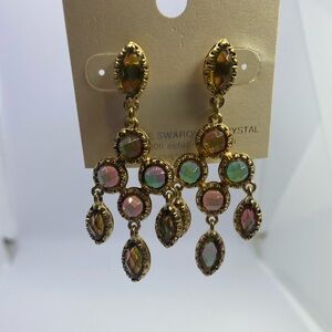 Gold tone & Greenish pink crystal pierced earrings.